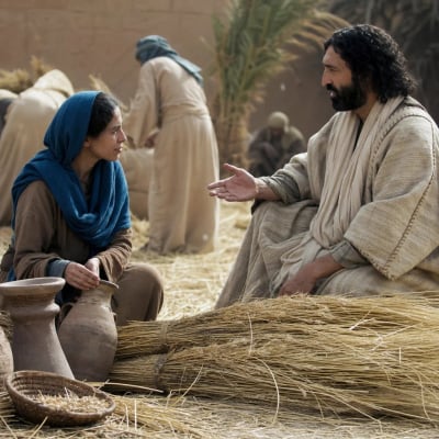 Boaz in the Bethlehem field addressing Ruth the gleaner, while reapers and maidens work nearby and water vessels stand ready.