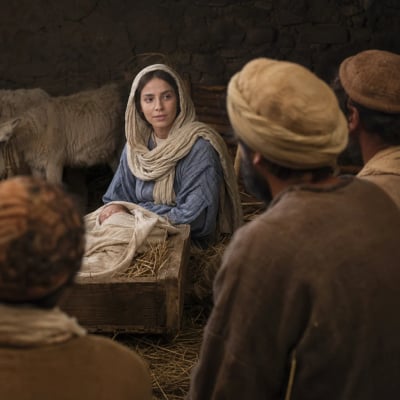 Mary near the manger after the shepherds' visit, reflecting silently on their message about Jesus.